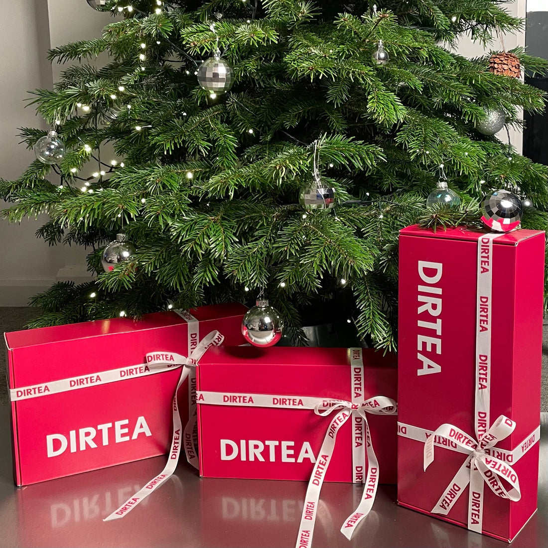 DIRTEA Christmas Gifting Boxset underneath a Christmas Tree 